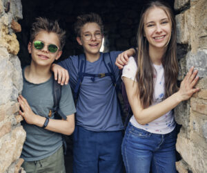 Siblings in foster care enjoying time together, highlighting the value of keeping sibling groups united. See how you can support youth in foster care